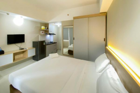 Homey and Well Furnished Studio Gateway Park LRT City Bekasi Apartment By Travelio